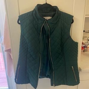 Forrest green light puffer vest with gold zipper